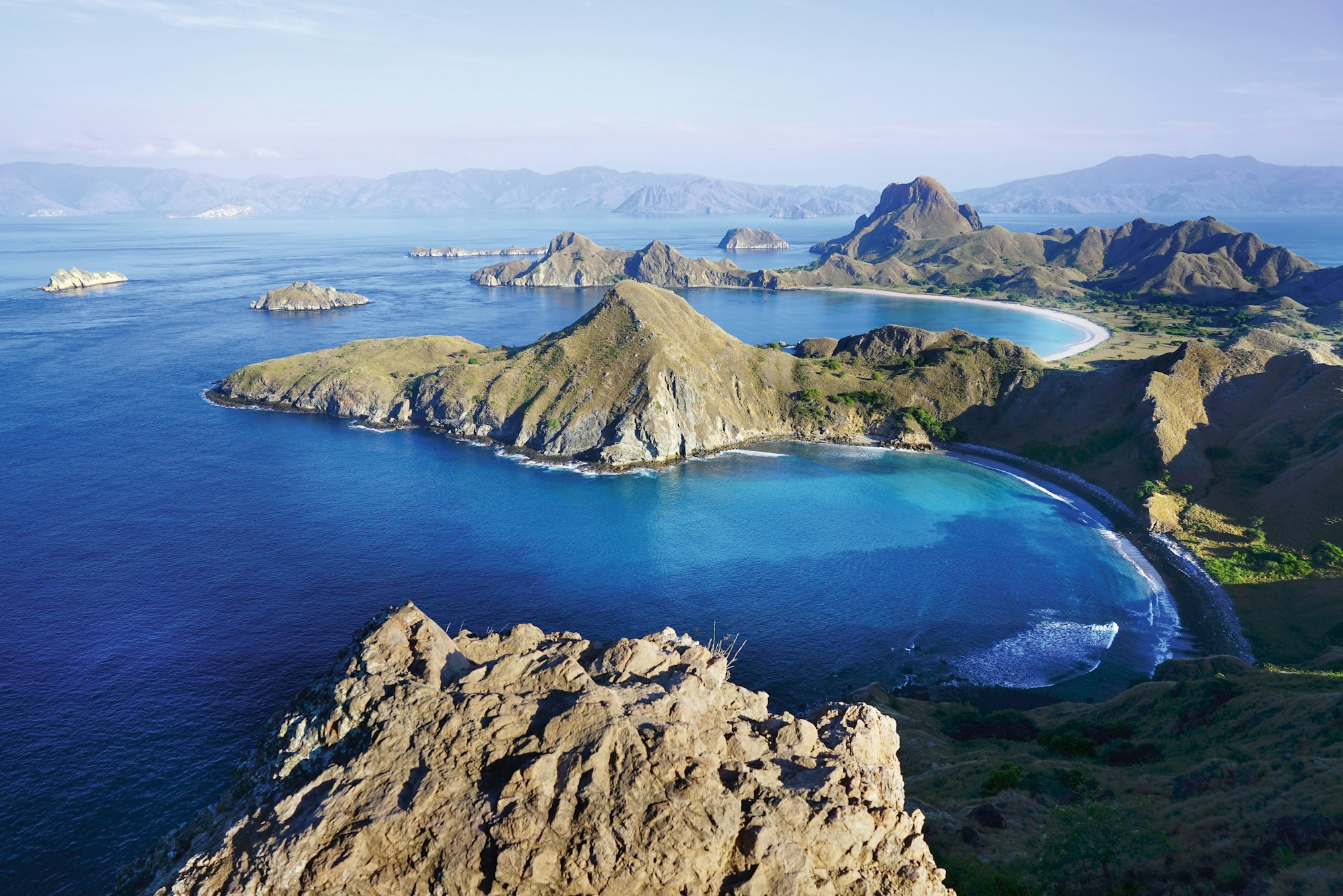 padar-island-with-scenic-high-view-of-three-beautiful-white-sandy-beaches-surrounded-by-a-wide-ocean.jpg